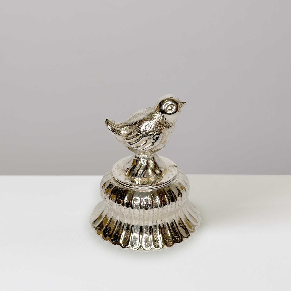 Silver Candle Snuffer with Bird design facing right