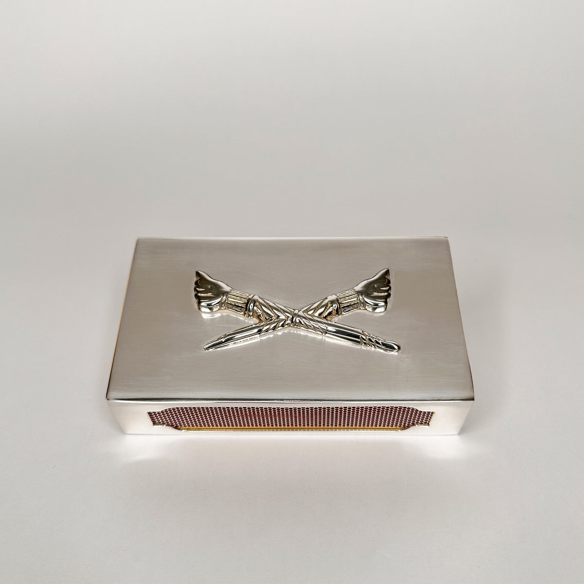 Silver Matchbox Sleeve with torch motif on the top